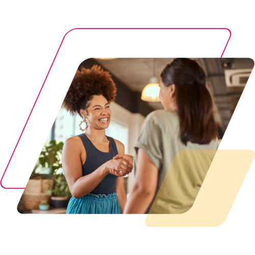 pink and yellow parallelograms with an image of two women shaking hands
