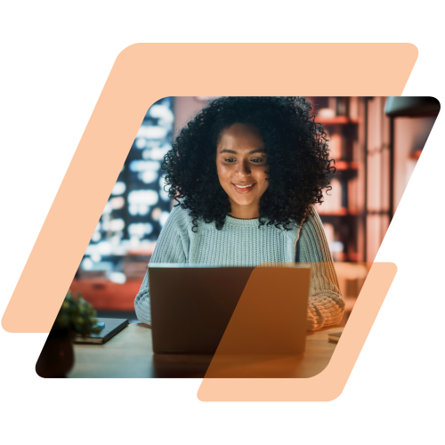 Image of a girl on a laptop masked in a parallelogram with orange parallelograms surrounding the image