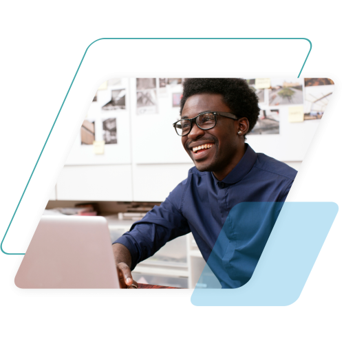 teal and blue parallelograms with an image of a man on a laptop cropped by a parallelogram