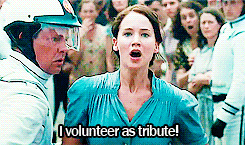 A GIF of Katniss Everdeen yelling "I volunteer as tribute!"