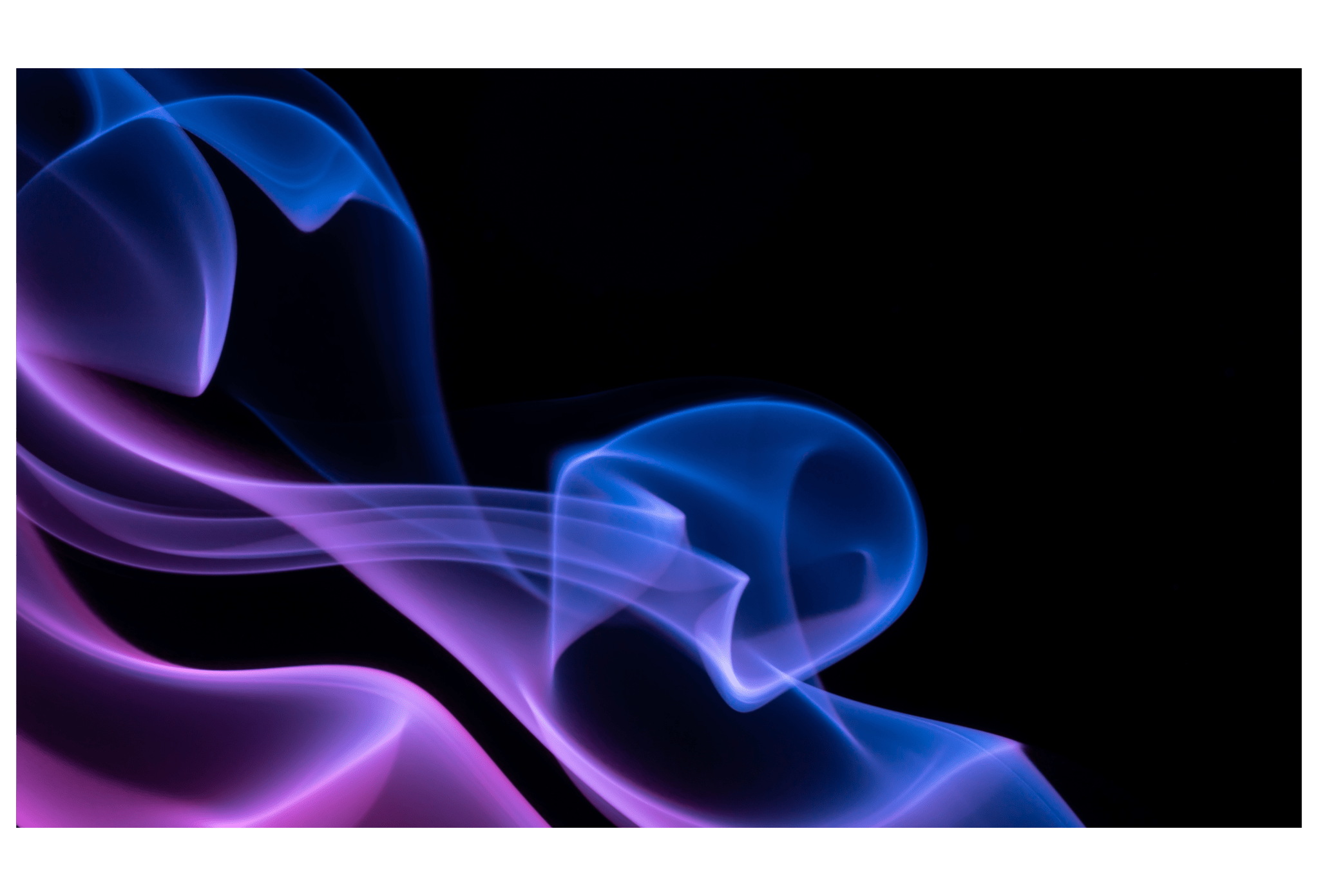 dark background with blue and pink smoke
