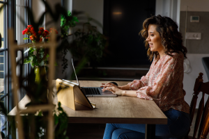 Person sitting at desk using computer