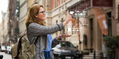 Women looking at digital shopping options in the air 
