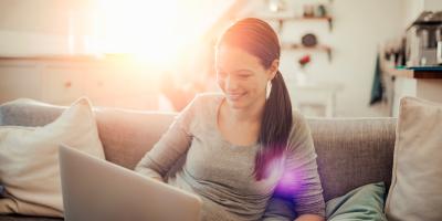 woman at laptop writing