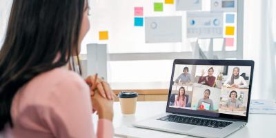 Woman having video conference on laptop