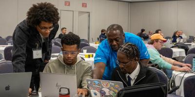 Attendees and an instructor working together during the Drupal Dev Days at DrupalCon Chicago 2026