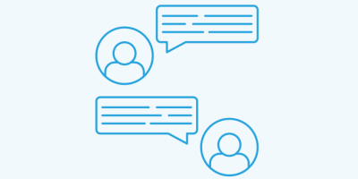 Two people having a conversation with speech bubbles between them