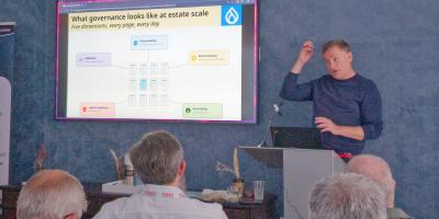 Christoph Briedert delivers a presentation at the Drupal AI Summit in NYC