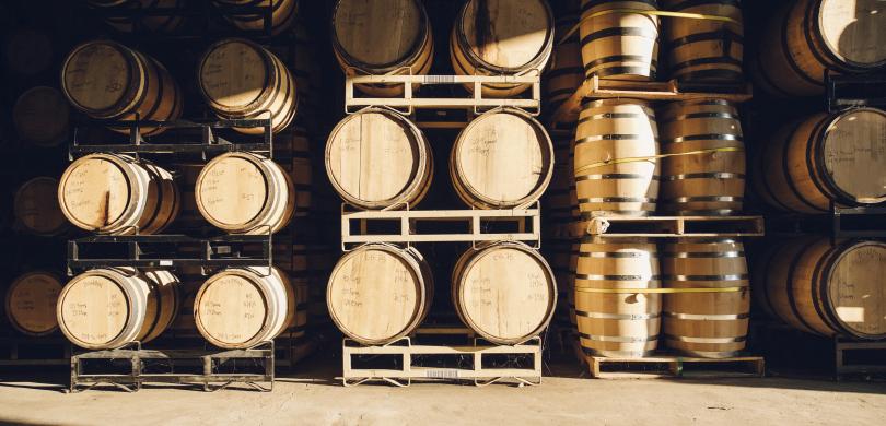Racks of distillery barrels
