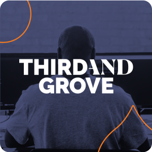 navy background over an image of someone at a computer with a white third and grove logo overlayed