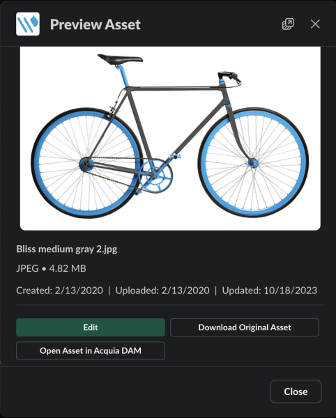 Blue fixed-gear bicycle with drop handlebars displayed on dark background