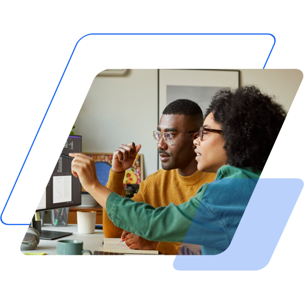 blue and teal parallelograms with an image of two people looking at a desktop