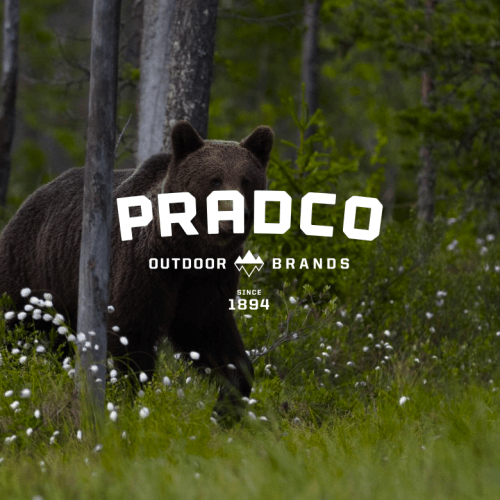 Image of bear in woods with Pradco logo over it