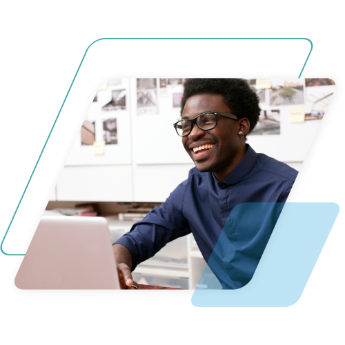 teal and blue parallelograms with an image of a man on a laptop cropped by a parallelogram