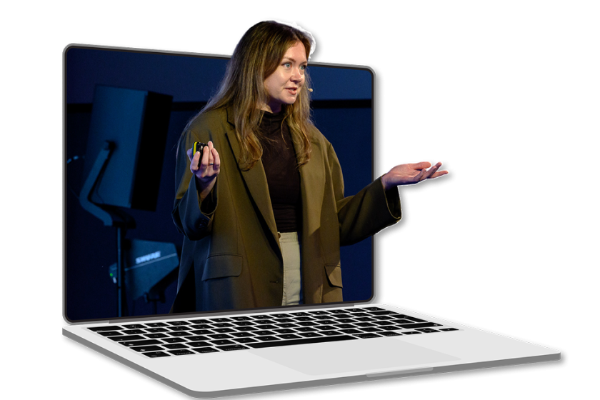 Woman in brown jacket gesturing while emerging from laptop screen