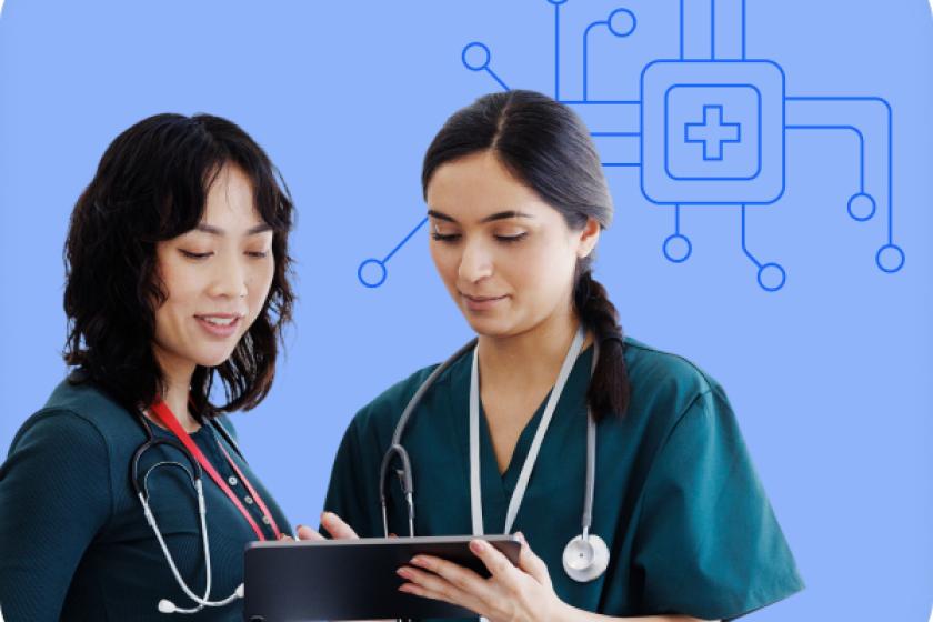two healthcare workers looking over a tablet with a CPU illustration behind them