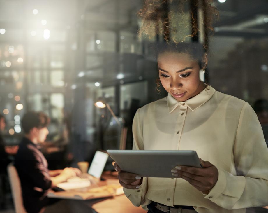 Business woman holding a tablet