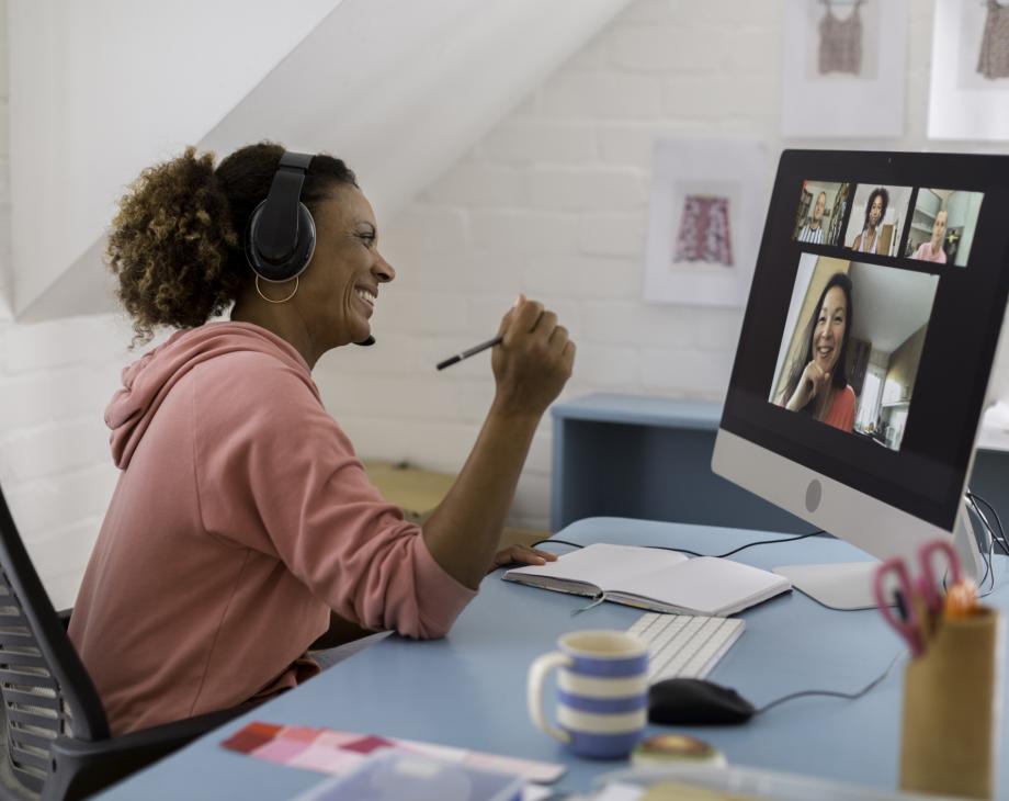 Woman in home office on video conference