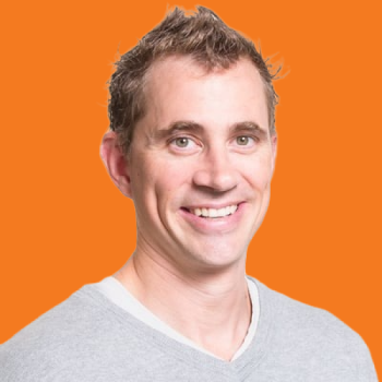 Stewart Dick Headshot Orange Background