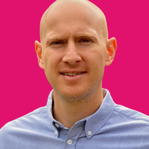 Headshot of Christian Buncher with Pink background
