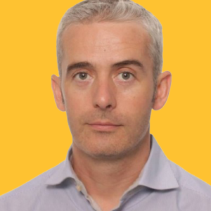 Headshot of David Green with Yellow background