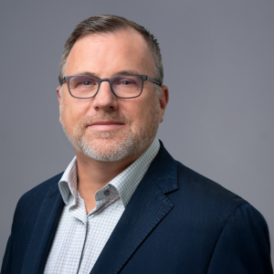 Chris-Tranquill Gray Background Headshot