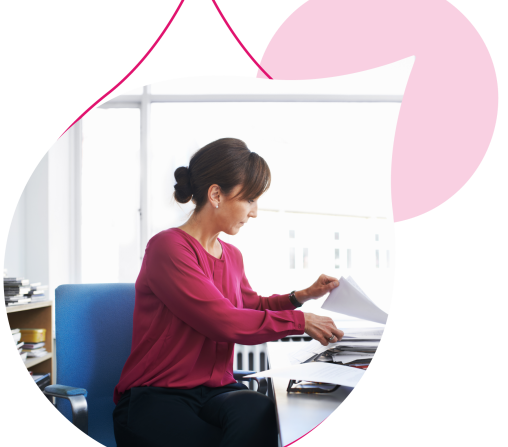 pink acquia droplets with an image of a woman in red on a computer