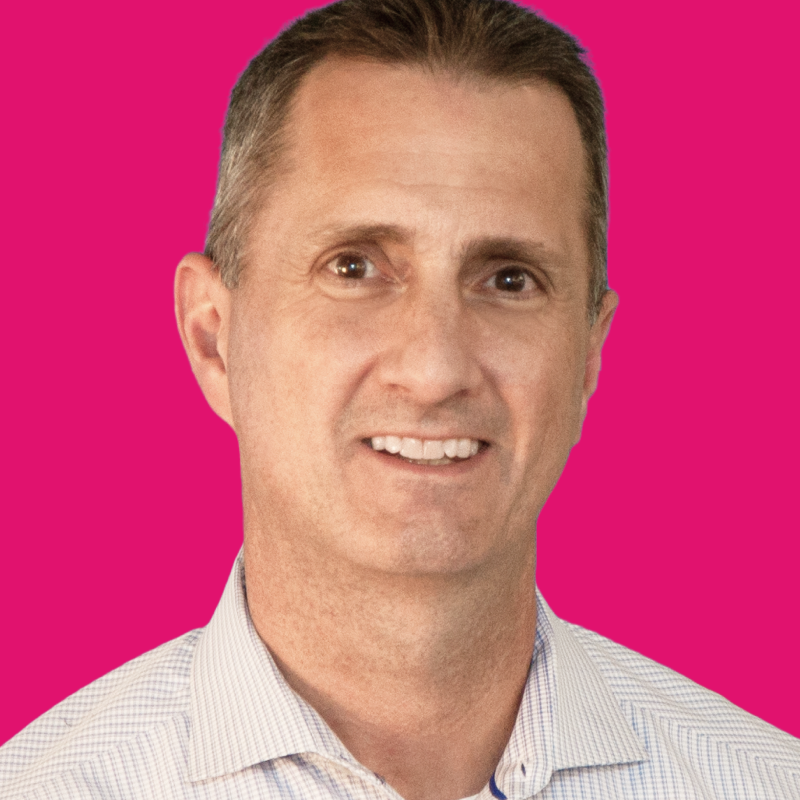 Stephen Reny headshot with pink background