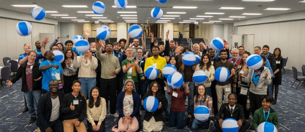 Drupal in a Day Participants having a lighthearted moment with beach balls at the end of the day
