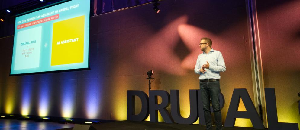 Dries on stage in Rotterdam speaking about connecting Drupal to AI agents